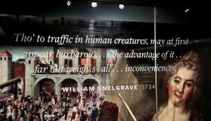 Display in museum that reads - “Tho’ traffic in human creatures ... may at first appear barbarous ... the advantage of it far outweigh(s) all …inconveniences.”