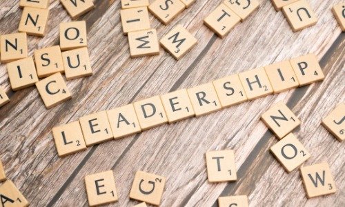 Scrabble leaders spelling out the word Leadership