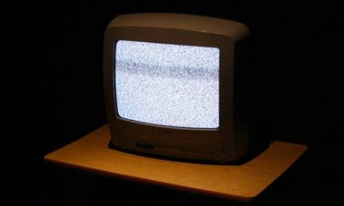 Television with white noise on the screen