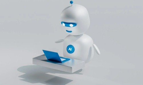 White robotic looking character sitting in front of a small laptop